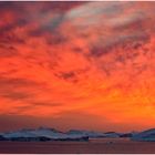 Red sky with icebergs in the Disco-Bay of Greenland
