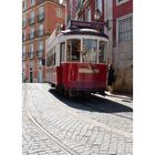 red street car in Lisboa