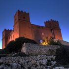 Red tower at blue hour