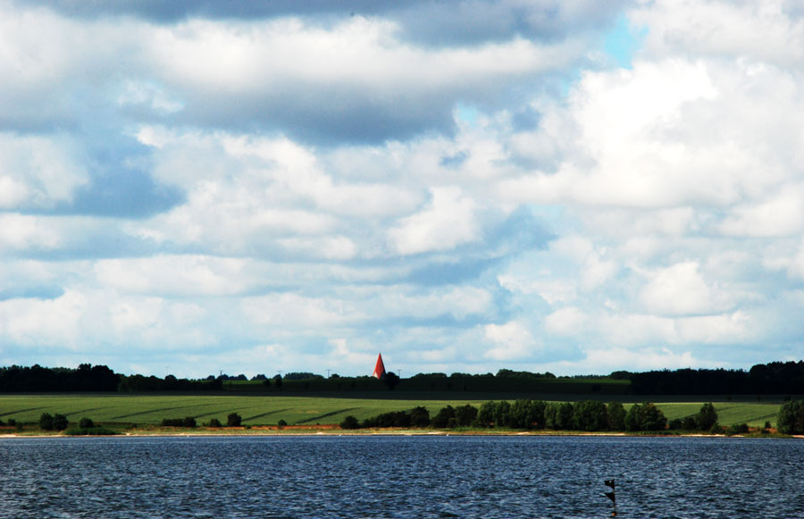 Red Tower in a World of Blue and Green