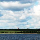 Red Tower in a World of Blue and Green