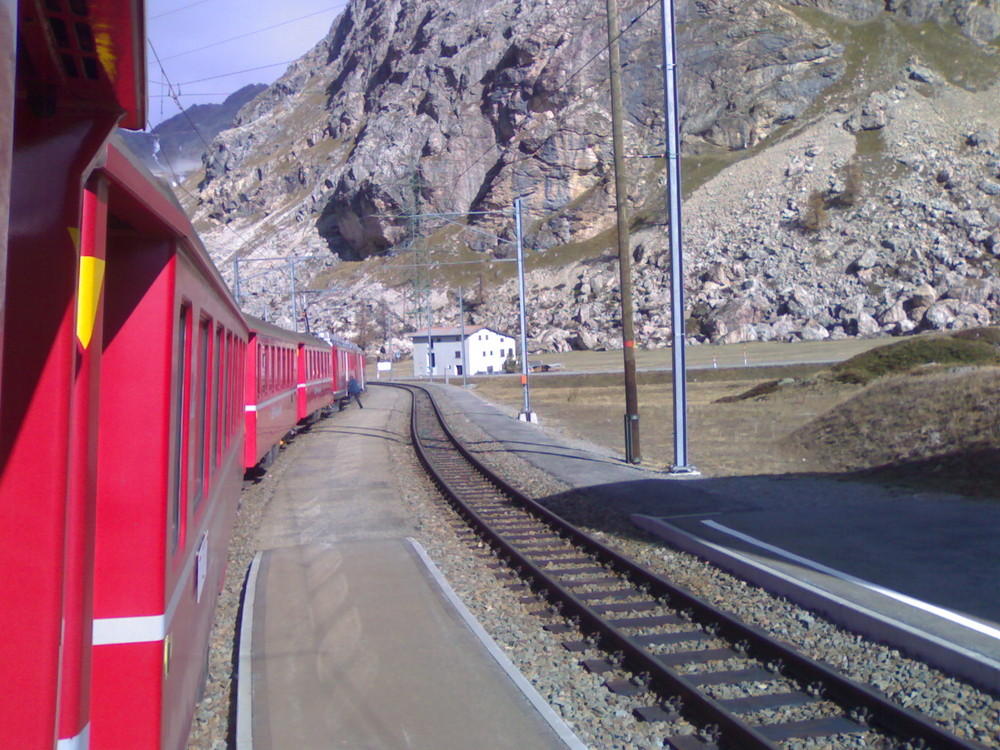 red train in alps