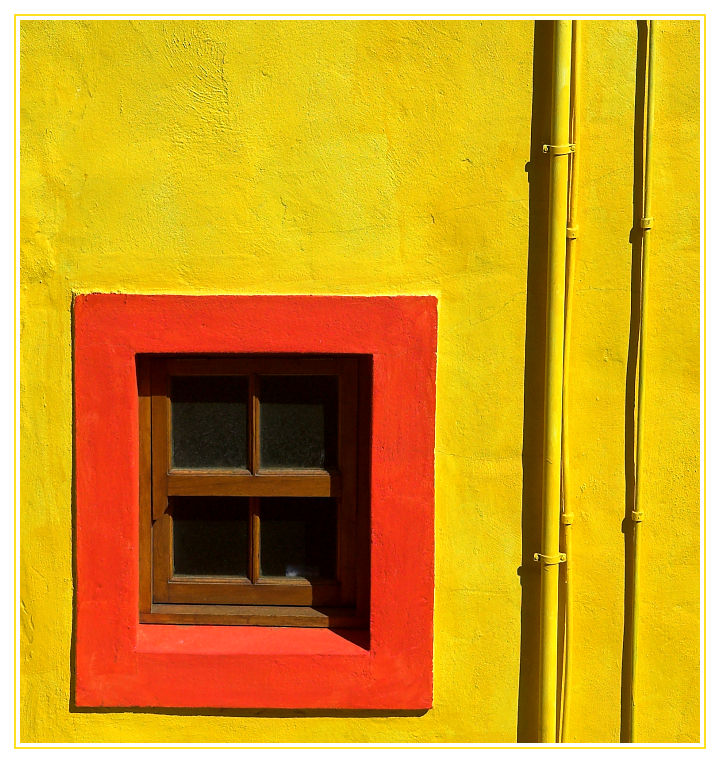 red window - yellow wall