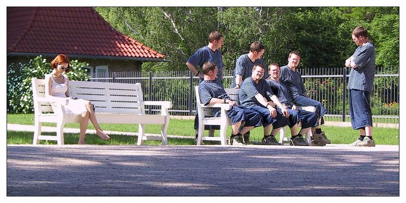 Redhaired Lady in White, Reading in a Park