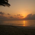 Reethi Beach Malediven Sonnenuntergang am Strand