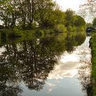 Reflecting by the canal