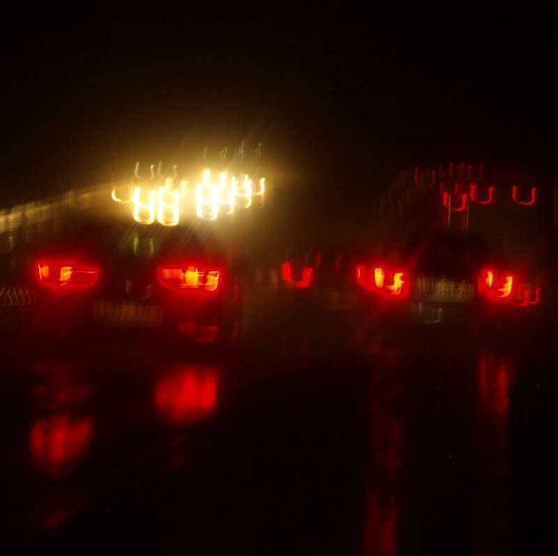 Reflection and speed / Rainy night on the highway