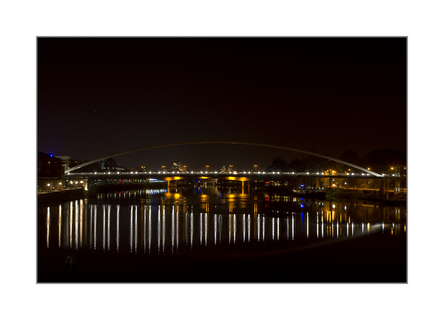 reflection walking bridge over the maas Maastricht