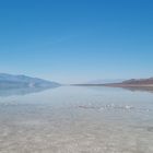 Reflections in the lake at Badwater Basin / Death Valley