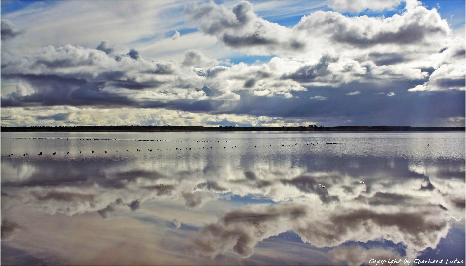 * reflective Lake Hart *