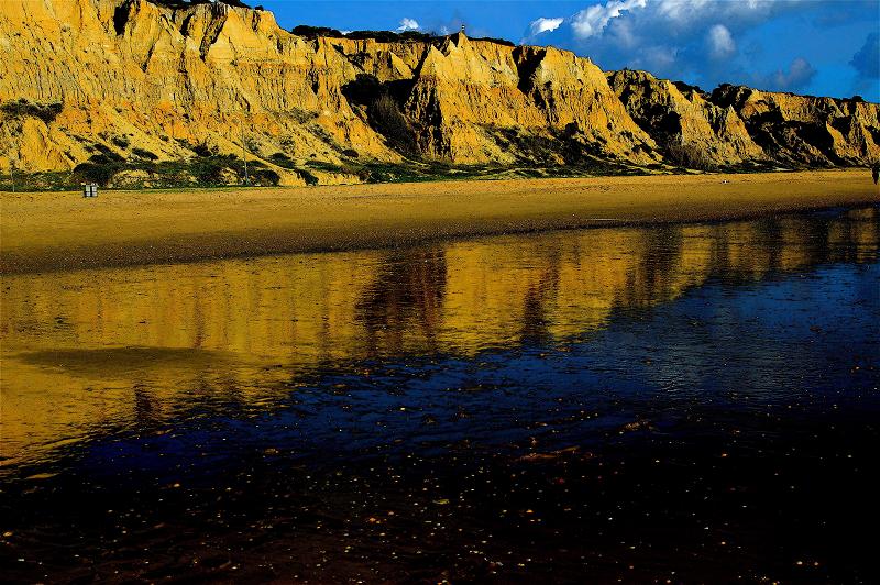 reflejos playa y cielo