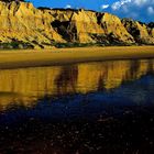 reflejos playa y cielo