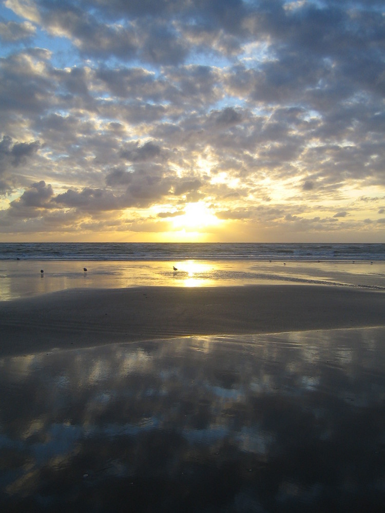 reflet des nuages dans la mer de tataphoto 