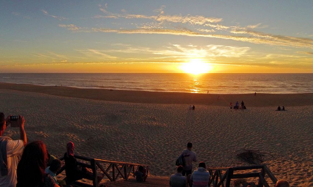 Regarder le coucher de soleil à Mimizan Plage