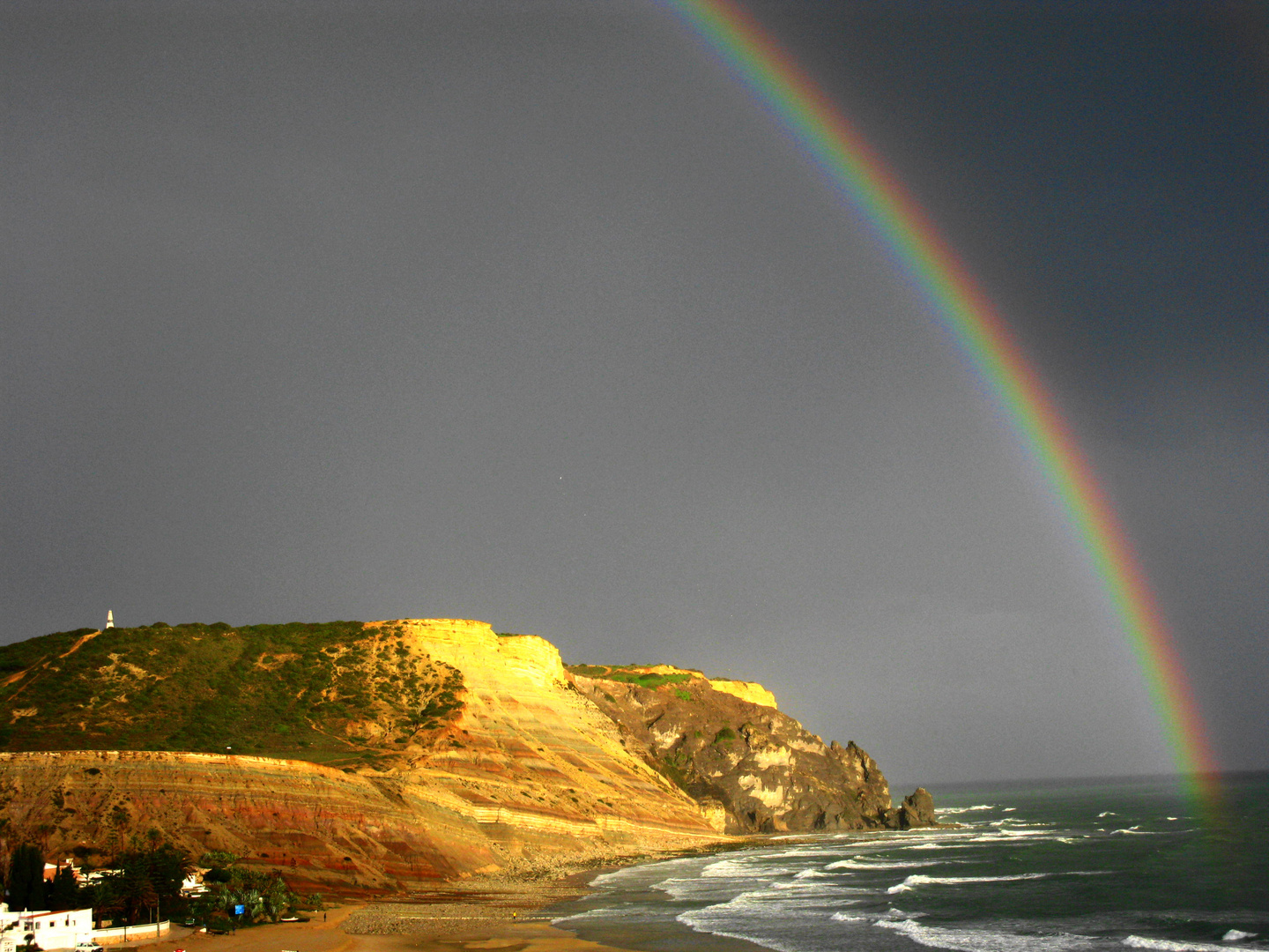 Regenbogen am Meer