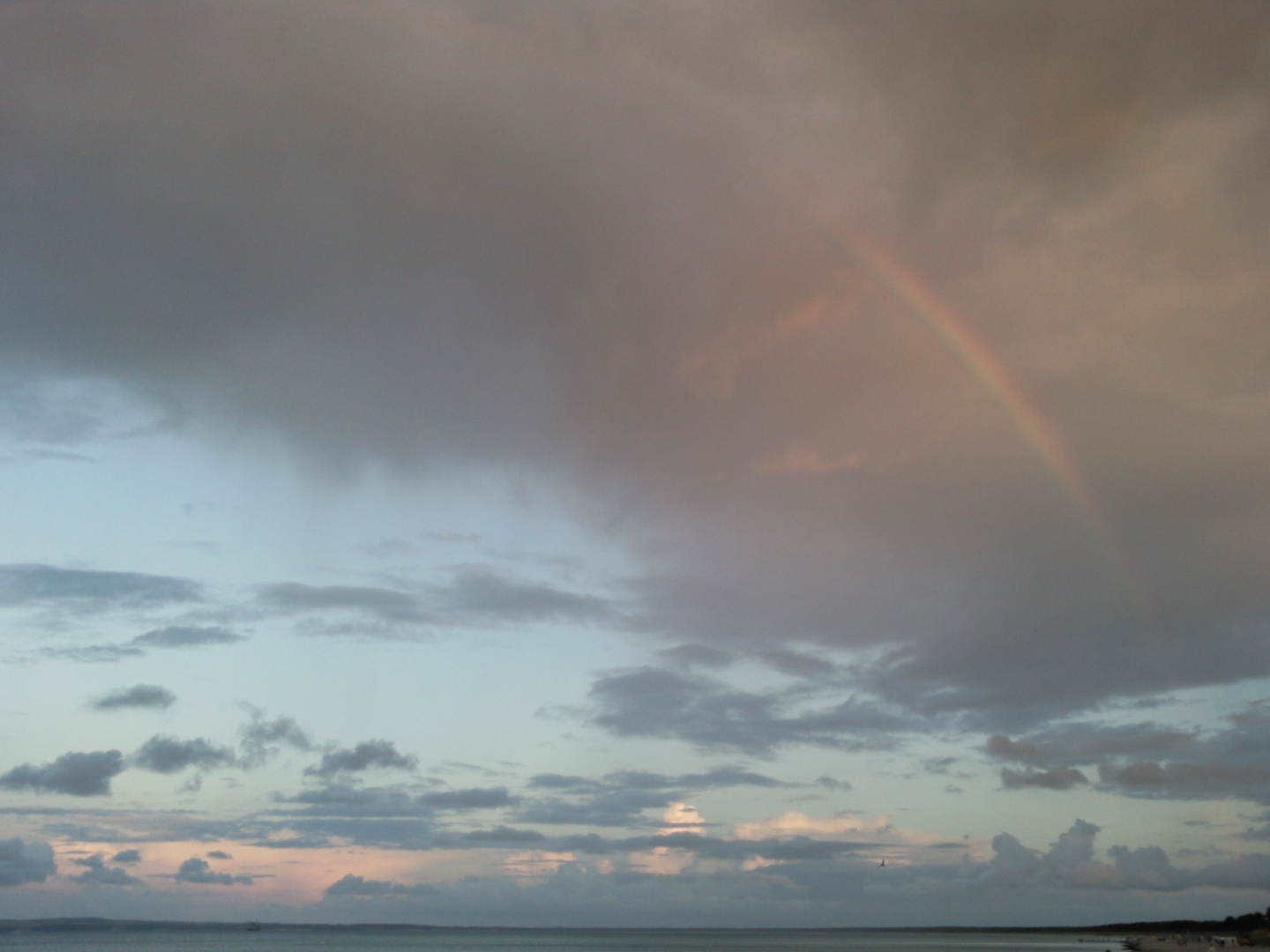 Regenbogen am Strand