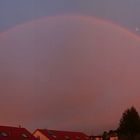 Regenbogen hinterm Haus