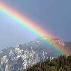 Regenbogen in den Bergen