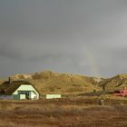 Regenbogen in den Dünen bei der Nordsee