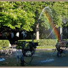 Regenbogen über dem Brunnen