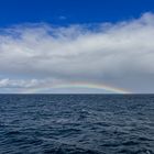 Regenbogen über dem Europäischen Nordmeer