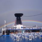 Regenbogen über dem Kreuzfahrtschiff - Azoren