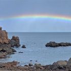 Regenbogen über dem Meer