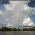 Regenbogen über dem Mekong, Laos