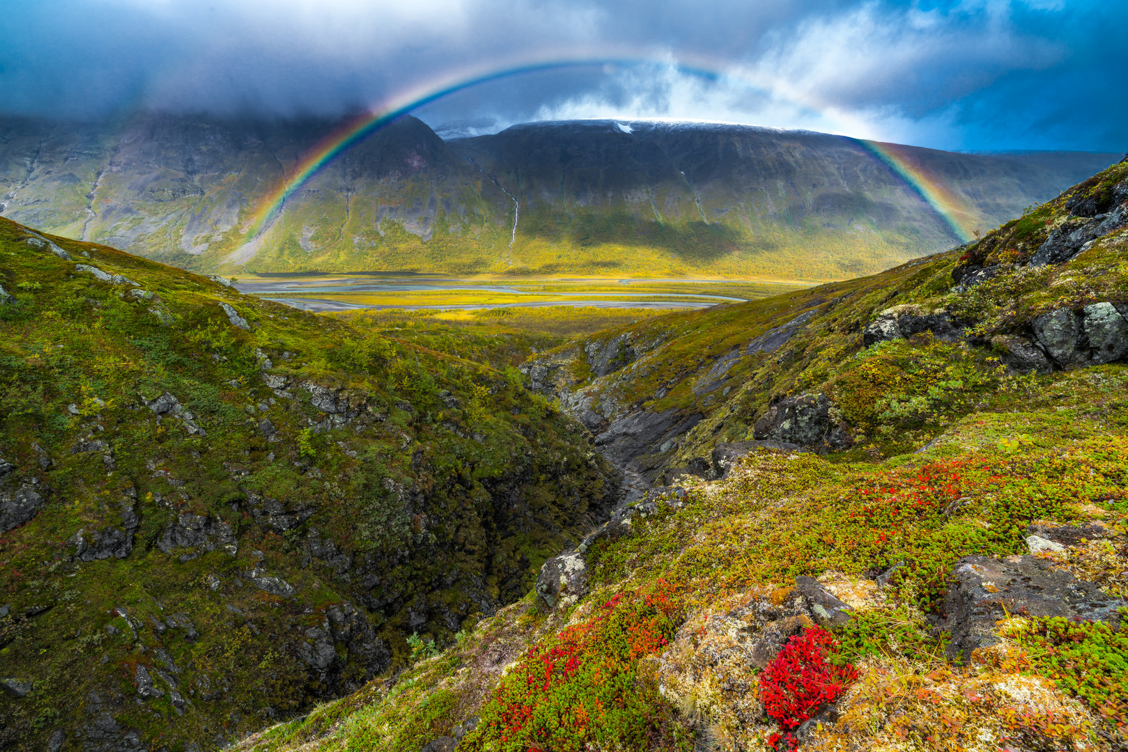 Regenbogen über dem Rapadalen