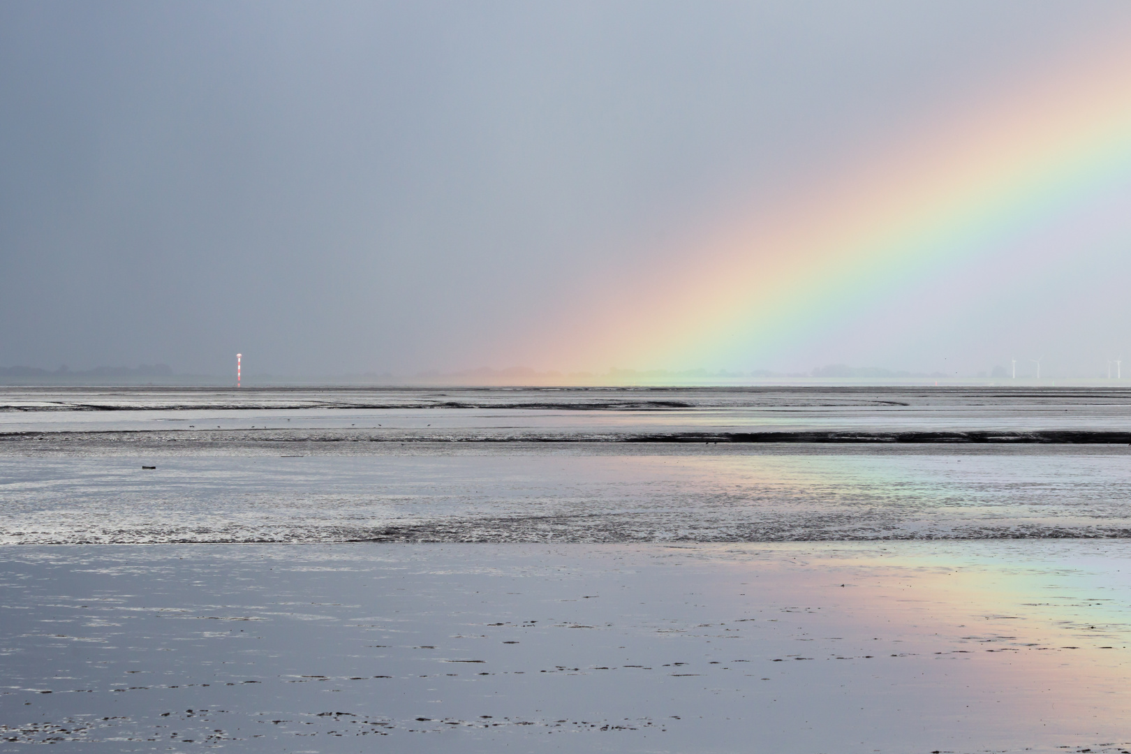 Regenbogen über dem Watt