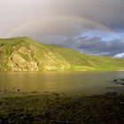 Regenbogen über dem Yukon