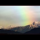 Regenbogen über den Bergen