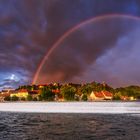 regenbogen über der stadt