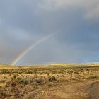 Regenbogen über der Wüste