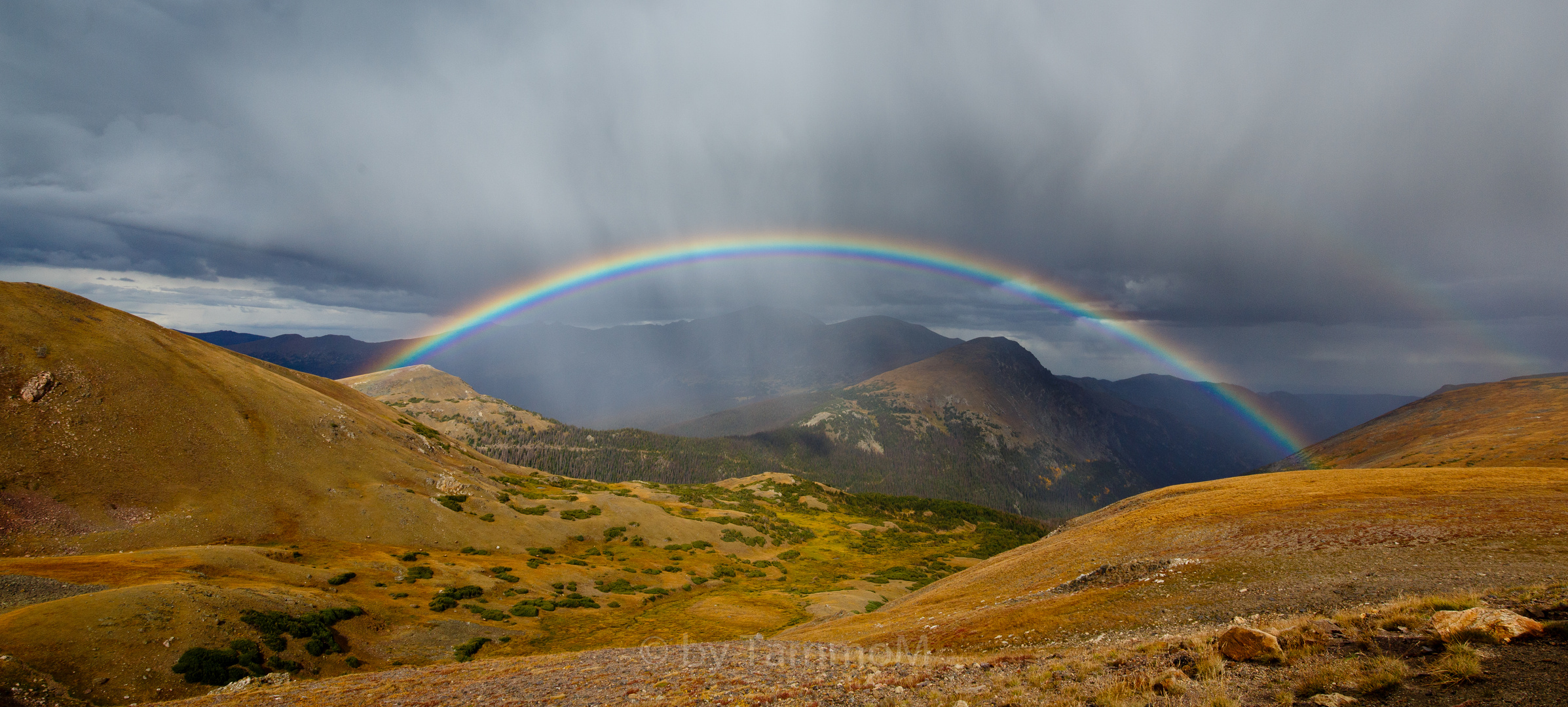 Regenbogen über Rocky Mountains