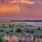 Regenbogen und Blitz im Abendlicht - Südafrika