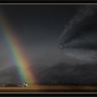 Regenbogen vor den Vogesen im Herbst