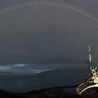Regenbogen vor Reykjavik