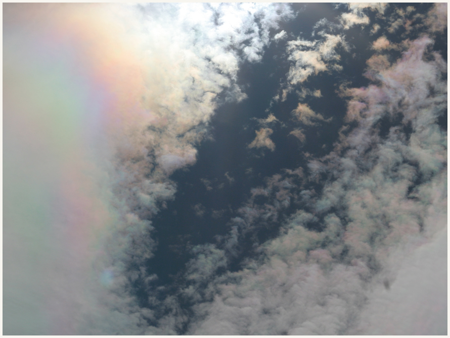 "Regenbogenwolken" über Porto Ronco