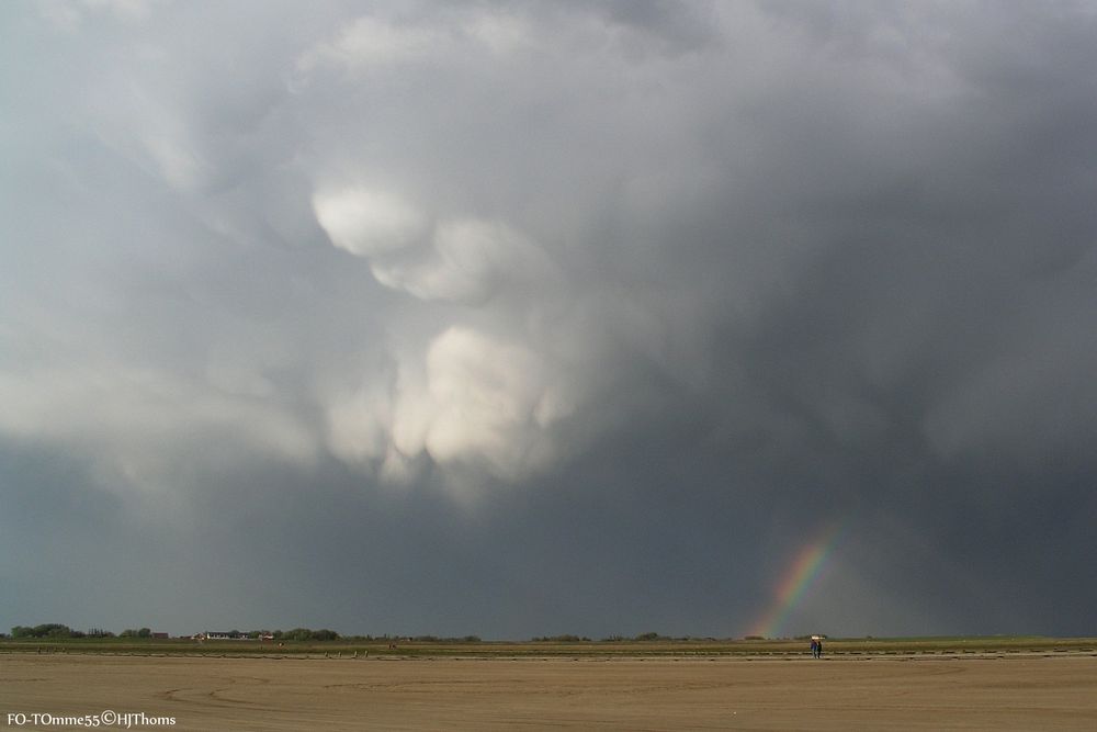 Regenwolken.Regenbogen