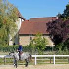 Reiten vor historischem Hintergrund