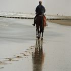 Reiter am Strand