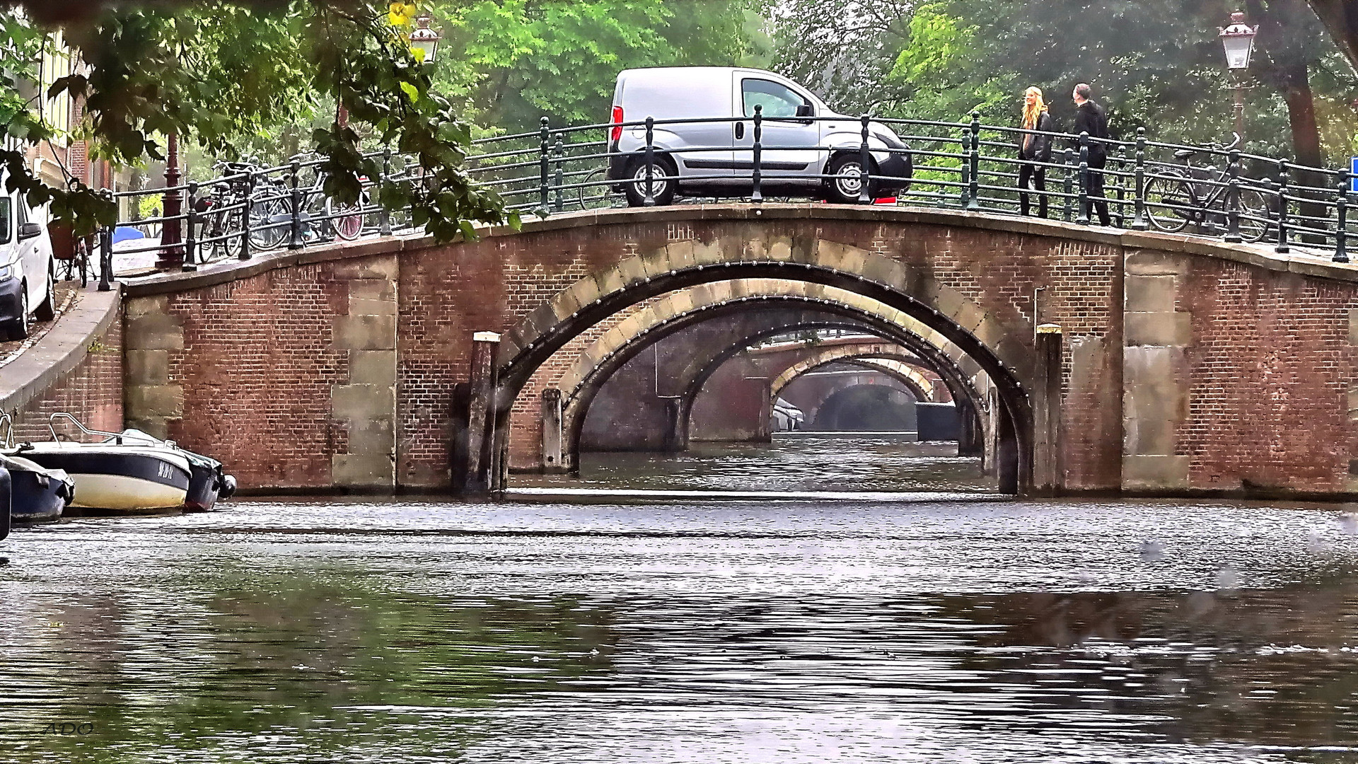 Rendezvous on the Bridge in the Rain in Amsterdam