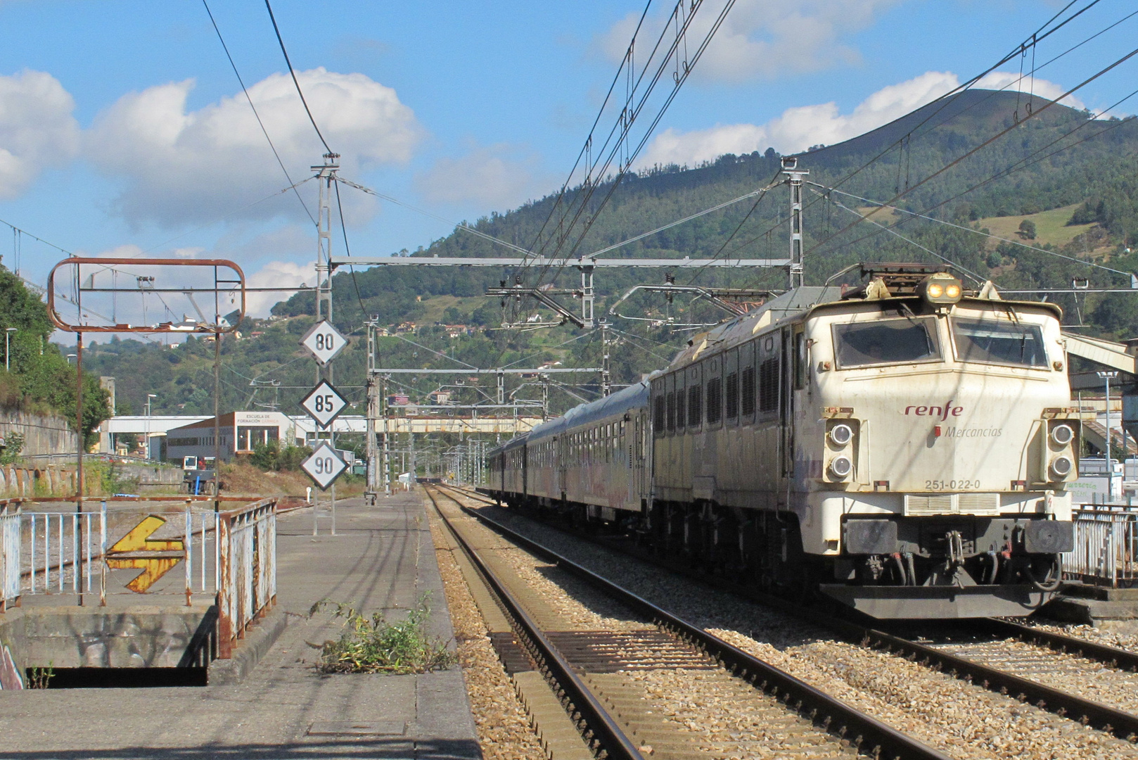 Renfe 251.022 with a military train at Mieres.