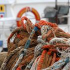 Reti da pesca e colori del porto