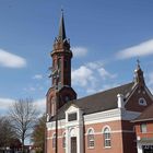 Rhauderfehner Kirche mit ein schöner Tjalk