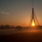 Rheinbrücken-Sonnenaufgang im Frühnebel