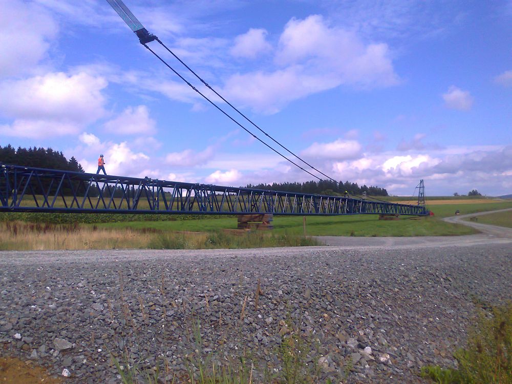 Riesenausleger zur  Endmontage von Rotor und Flügel in 135 m Höhe