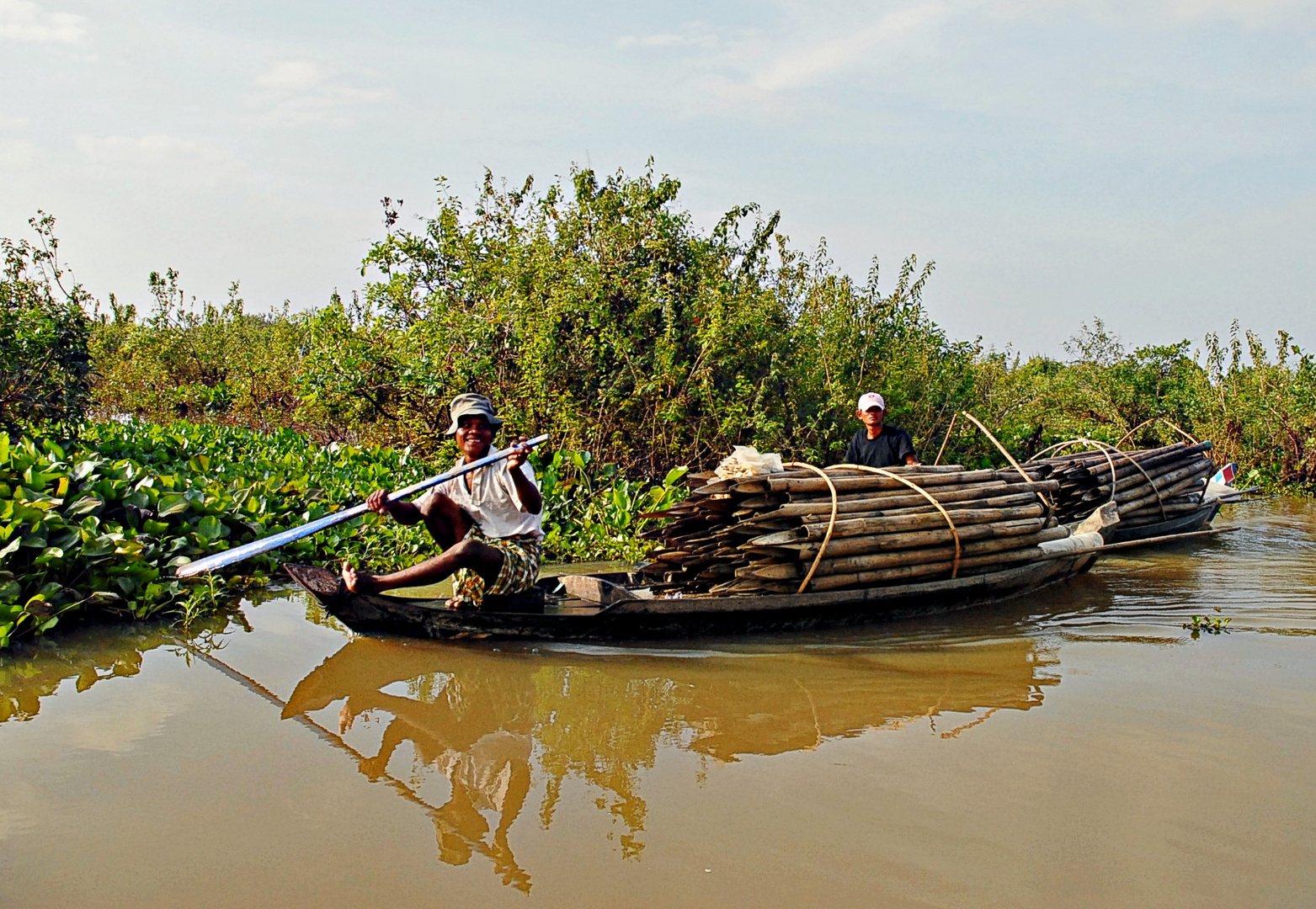 Rieur, sur son transport de bambous