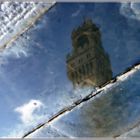 Riflessi(Torre di piazza della Signoria vista da una pozzanghera)